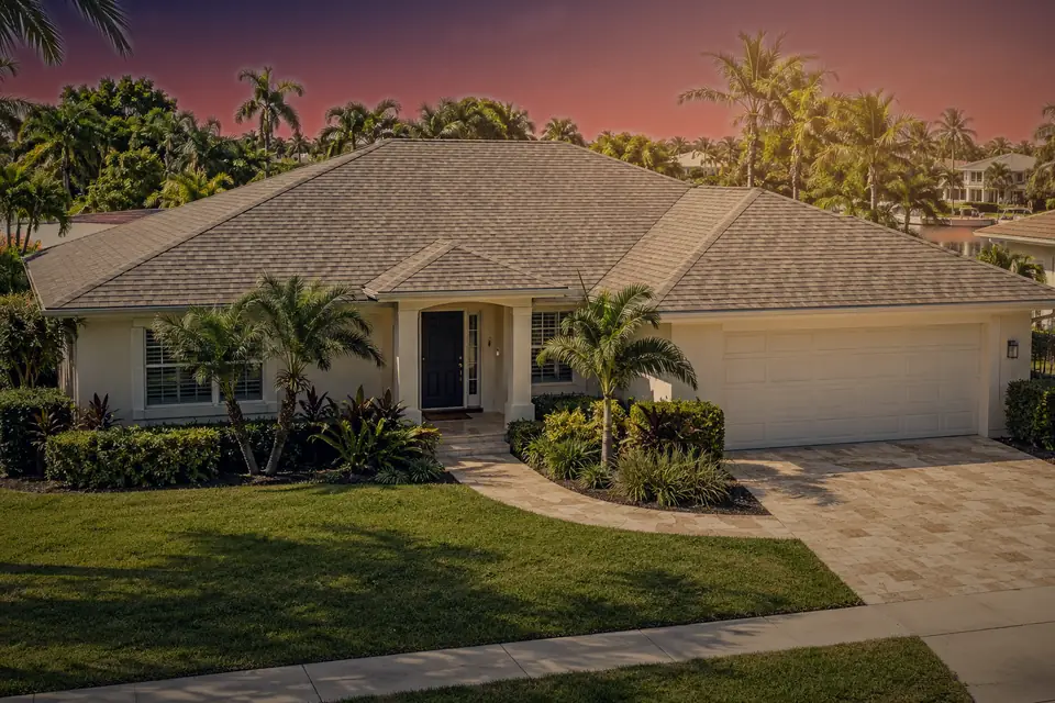 Architectural shingle roof at sunset
